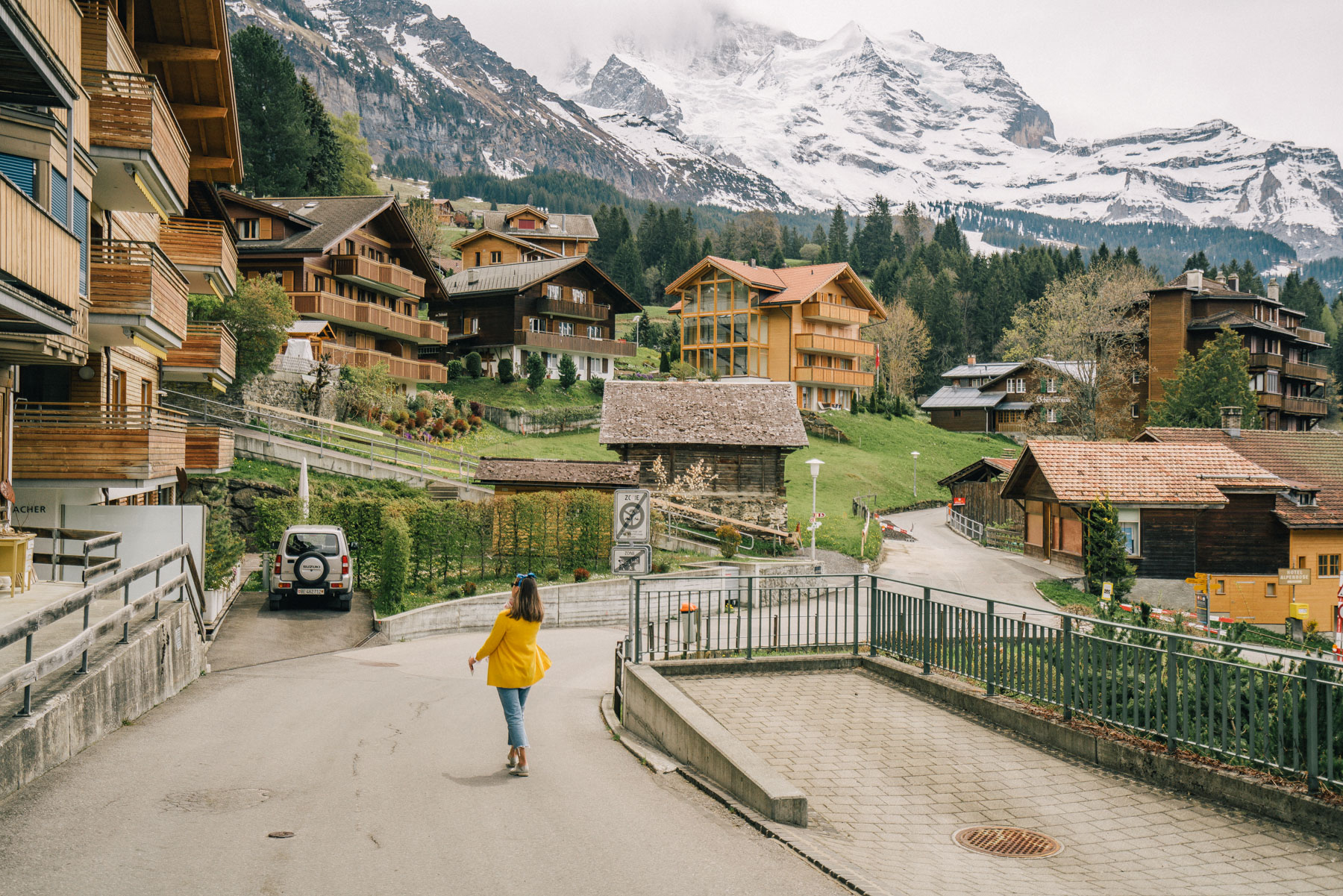 woman walking the street of Wengen in Switzerland